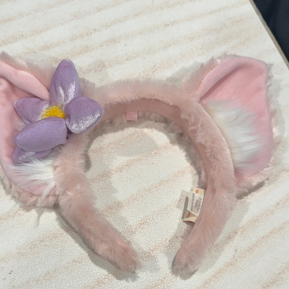 Disney Pink Furry Headband with Purple Flower